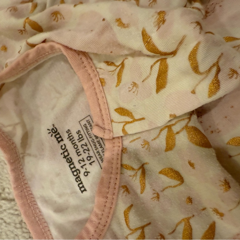 Magnetic Me Baby Onesie with Gold Floral Pattern